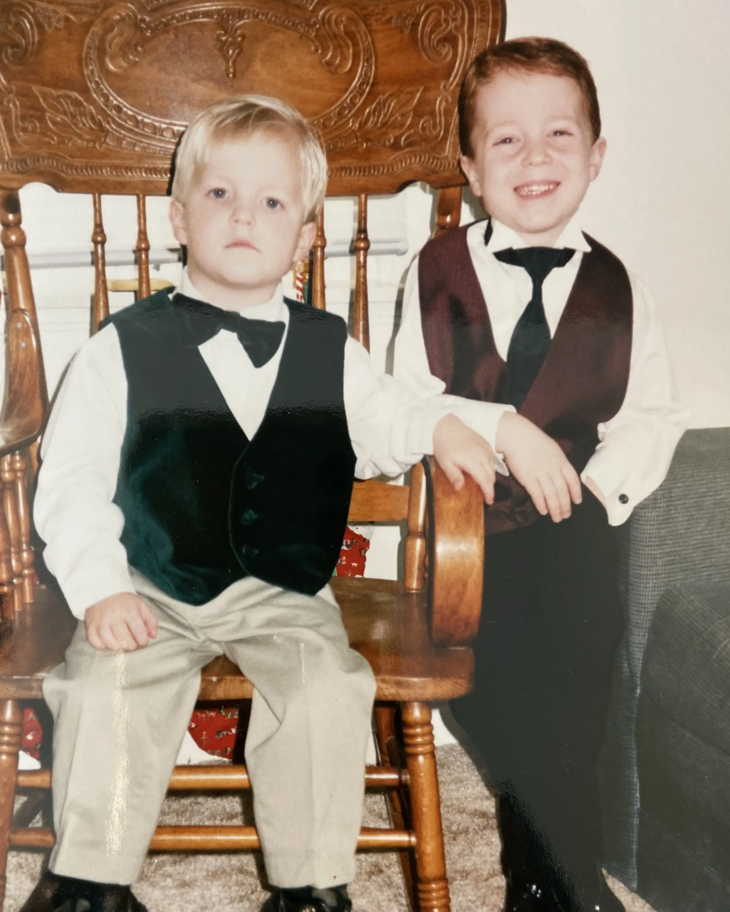 4 year old Jesse sitting in a baller bow tie.